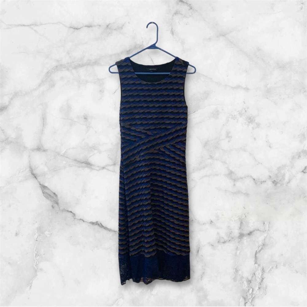 Blue with black dress, has been used but it’s still good